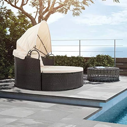 “Stylish patio daybed with retractable canopy. Durable wicker rattan, flexible seating. Ideal for outdoor comfort.