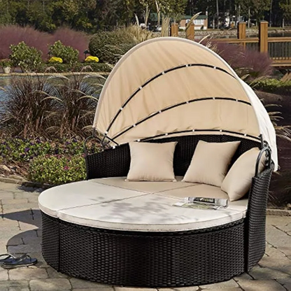 “Stylish patio daybed with retractable canopy. Durable wicker rattan, flexible seating. Ideal for outdoor comfort.